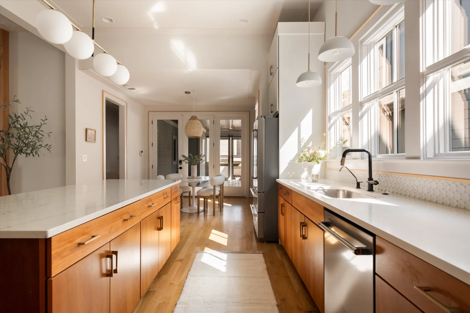 The kitchen looking through to the breakfast room and the porch doors beyond
