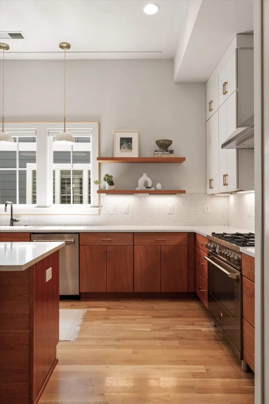 The kitchen: cherry cabinetry, open shelves and the range